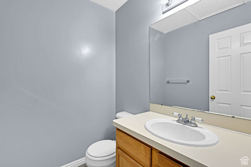 Bathroom with vanity and toilet