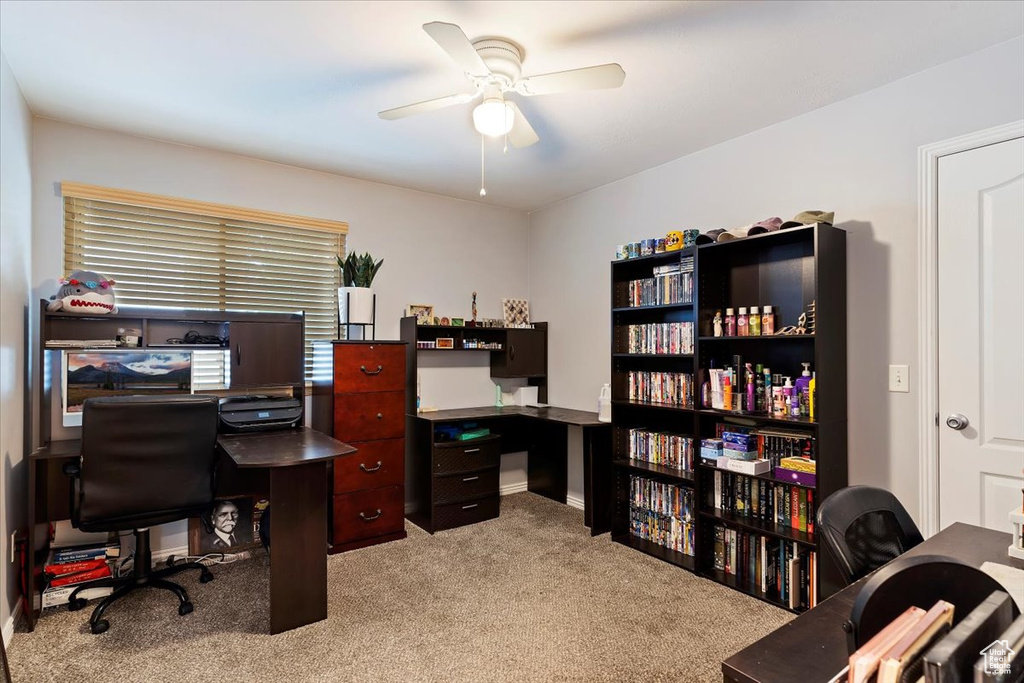 Carpeted office with ceiling fan