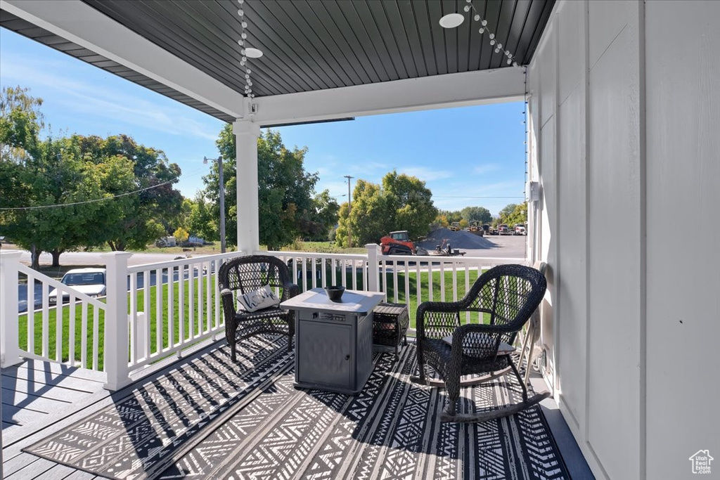 Wooden terrace with a yard