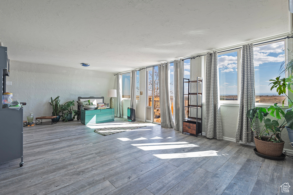 Unfurnished bedroom featuring hardwood / wood-style floors