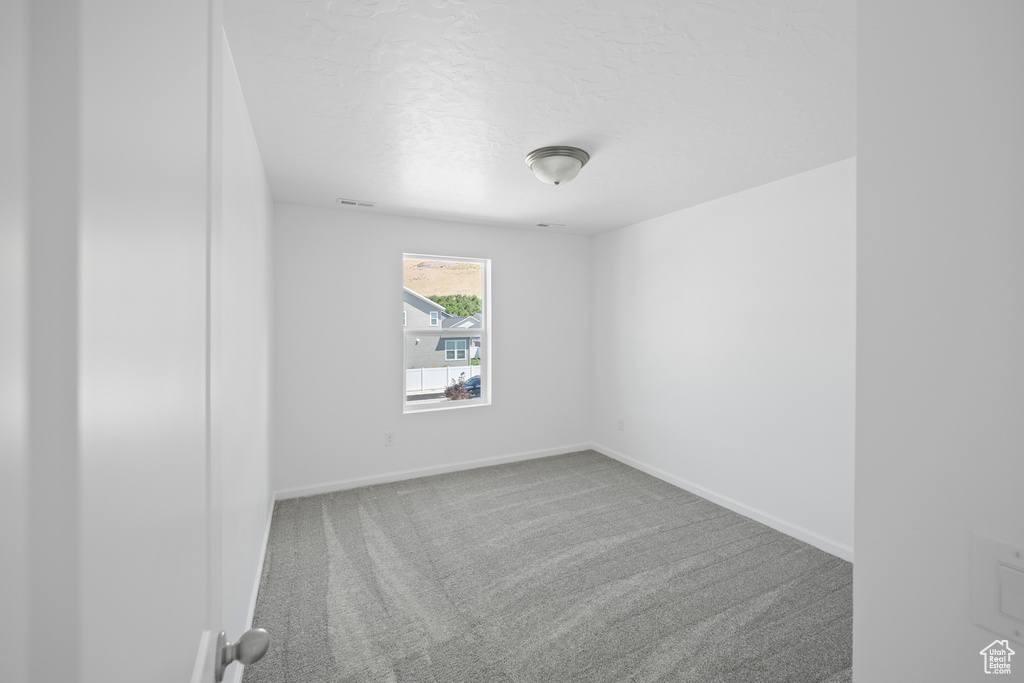 Spare room with carpet