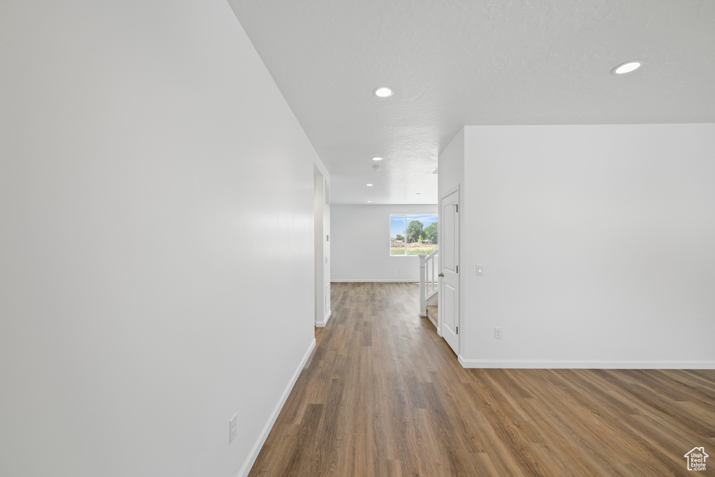 Corridor with wood-type flooring