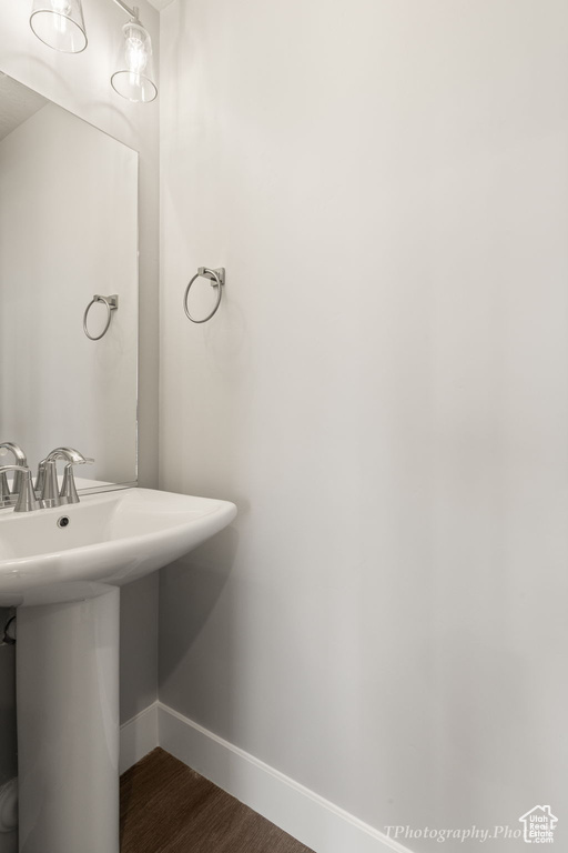 Bathroom featuring wood-type flooring