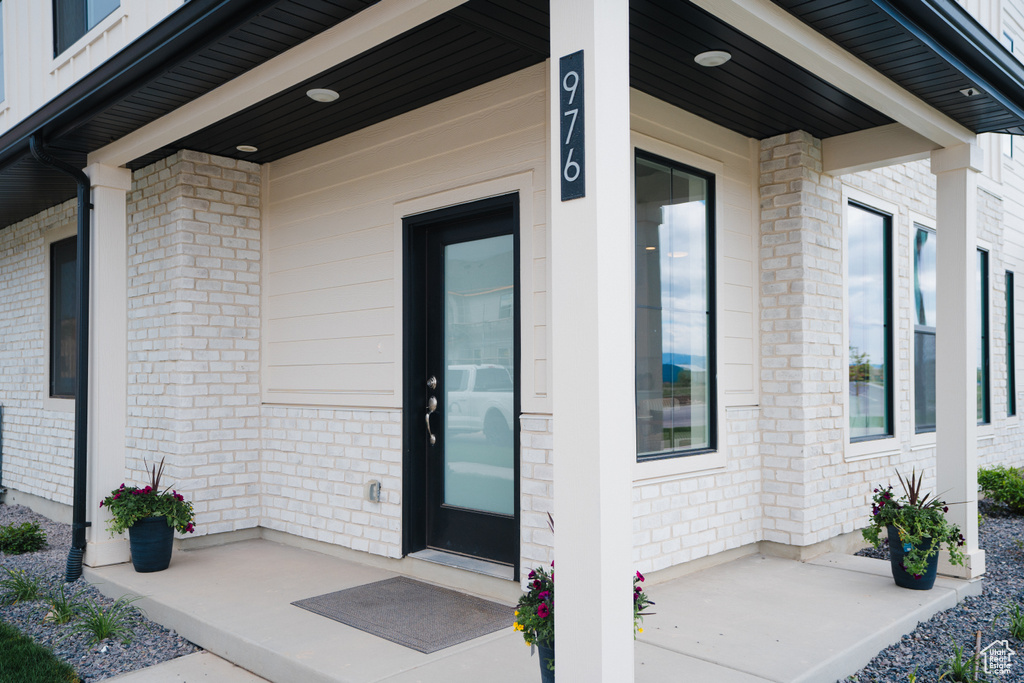 Entrance to property with covered porch