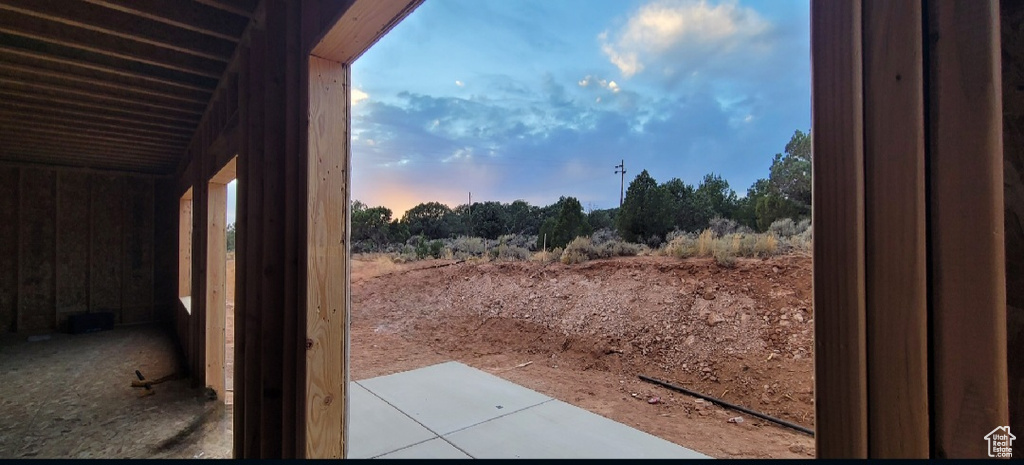 View of yard at dusk