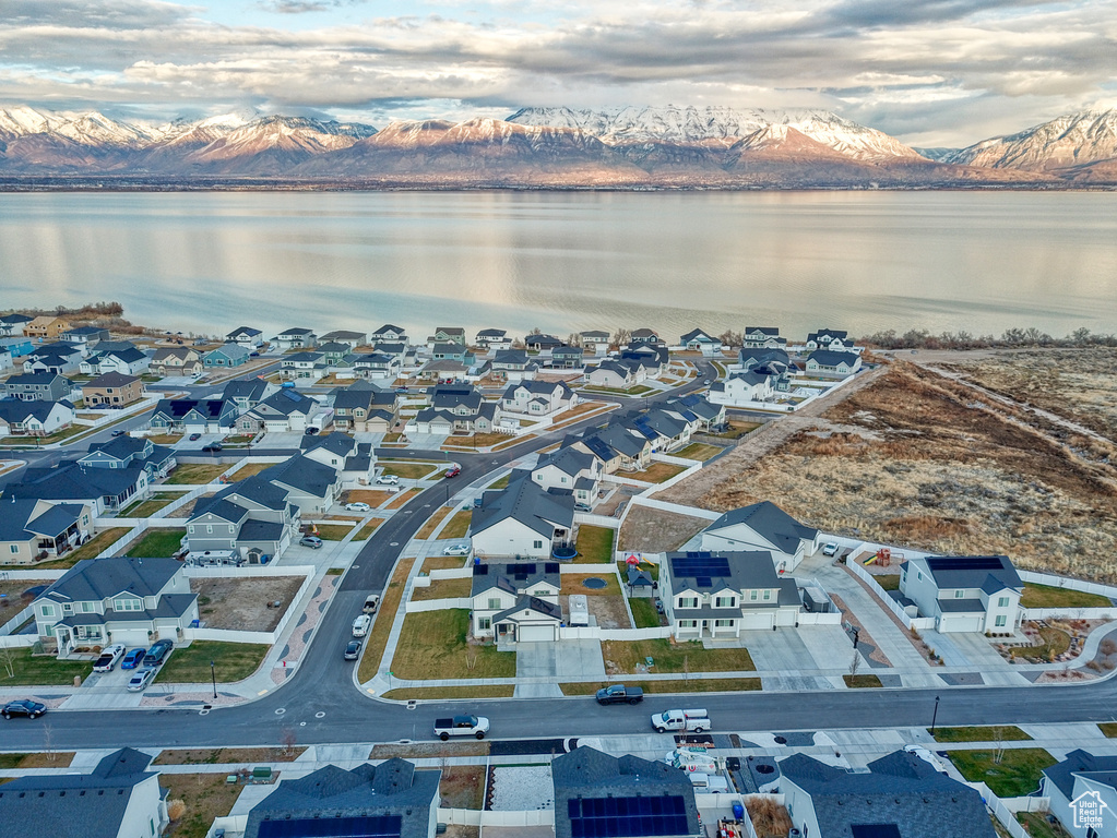 Aerial view featuring a water and mountain view