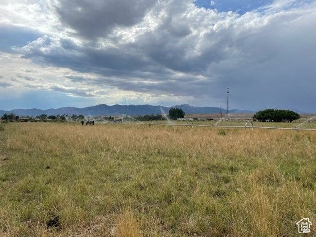 View of mountain feature with a rural view