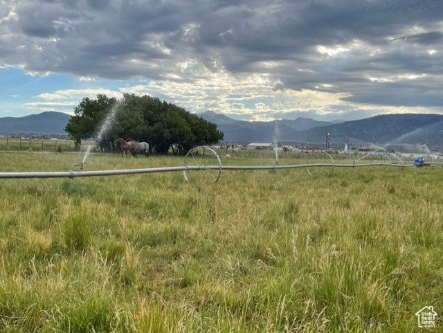 View of mountain feature with a rural view