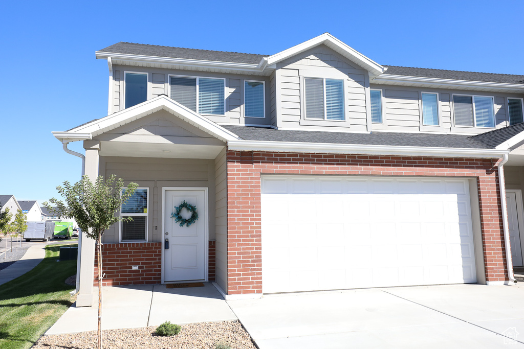 View of front of house with a garage