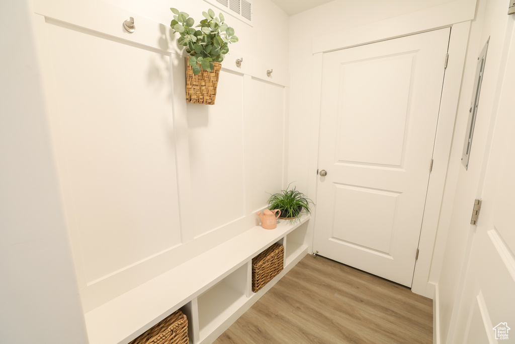 Mudroom featuring light wood-type flooring