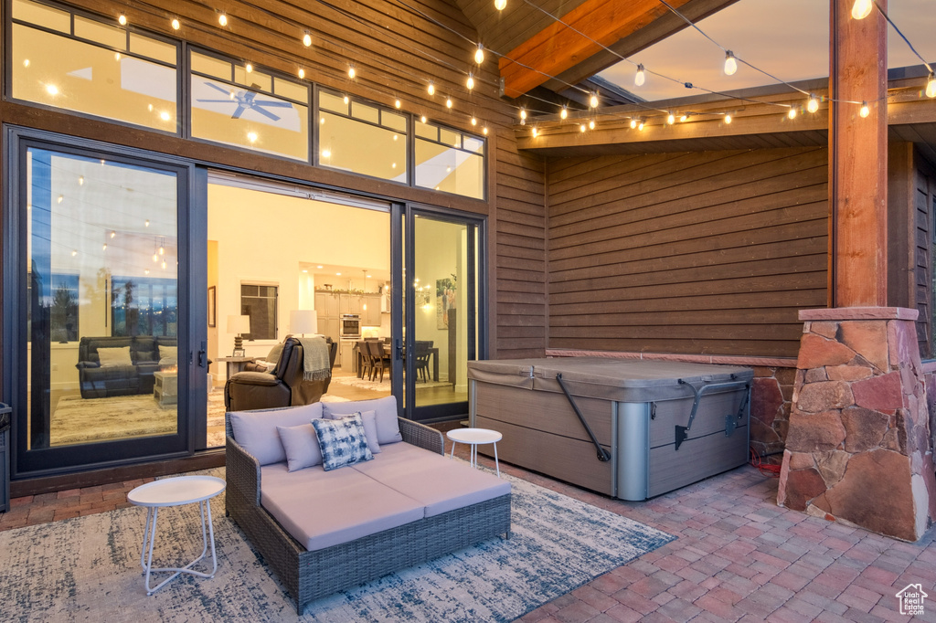 View of patio / terrace featuring a hot tub