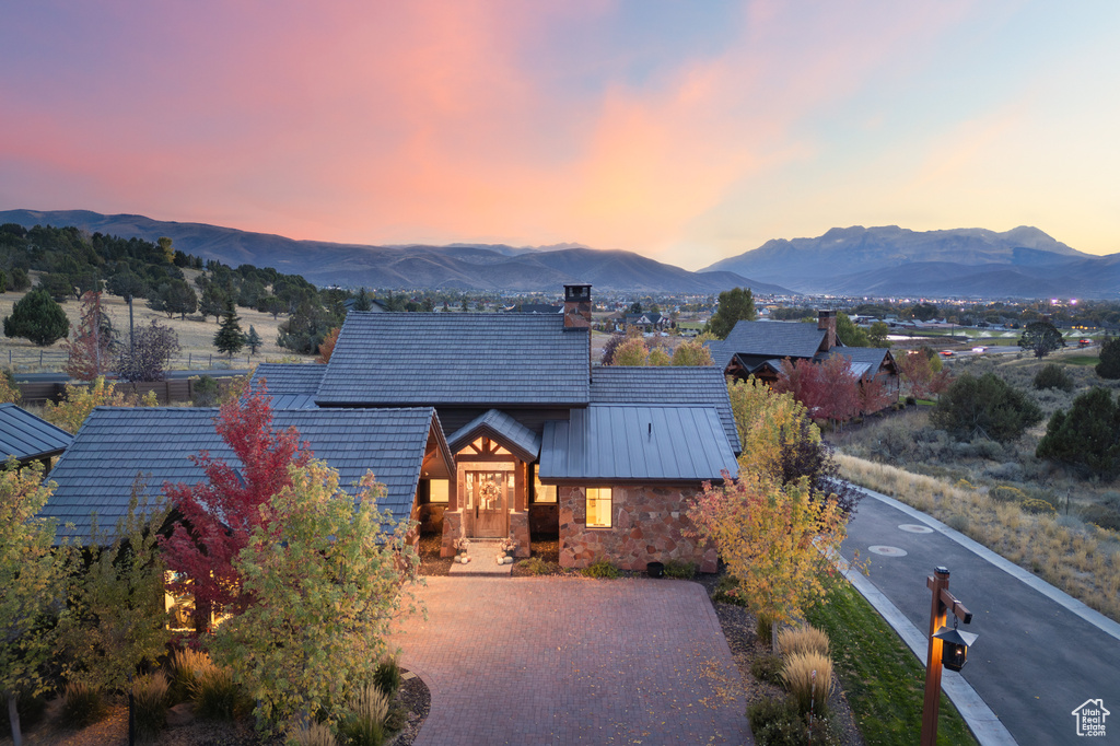 View of front of home featuring a mountain view