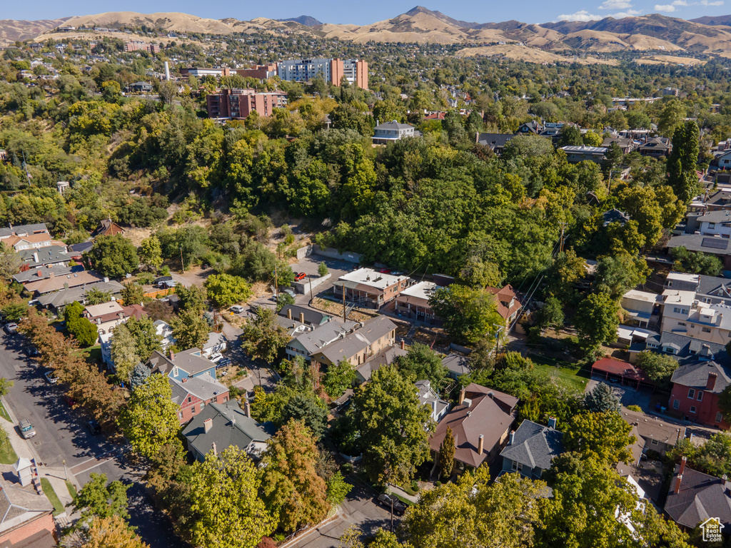 Birds eye view of property with a mountain view