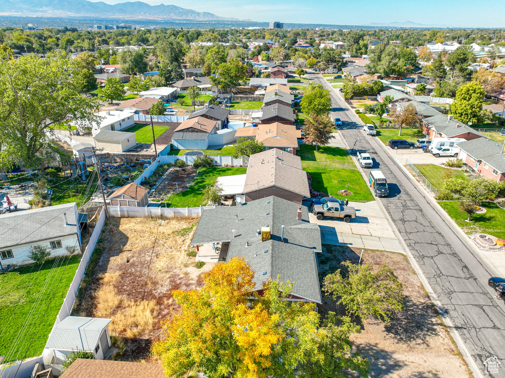 Birds eye view of property with a mountain view