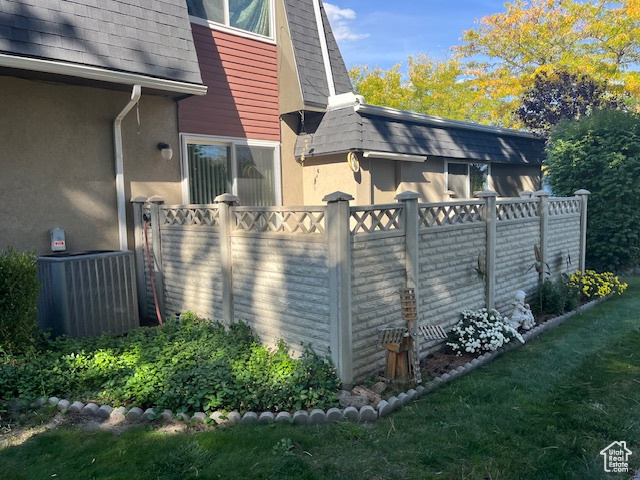 View of property exterior with central AC