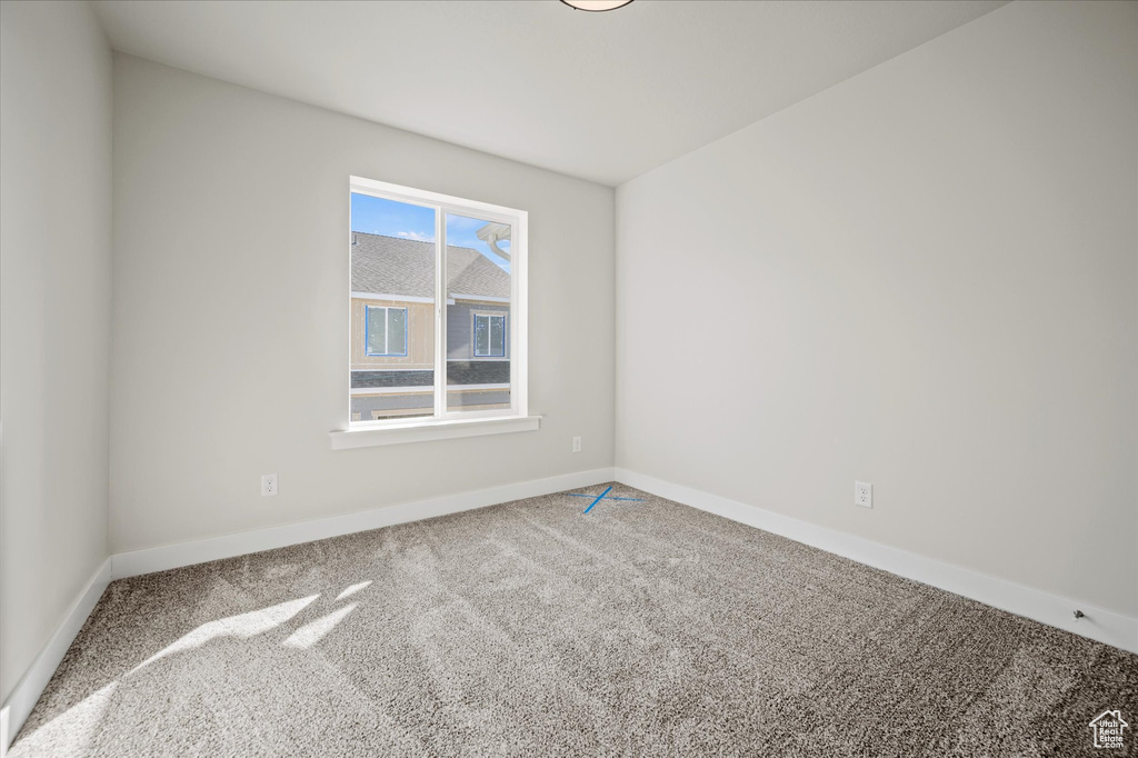 Empty room featuring carpet