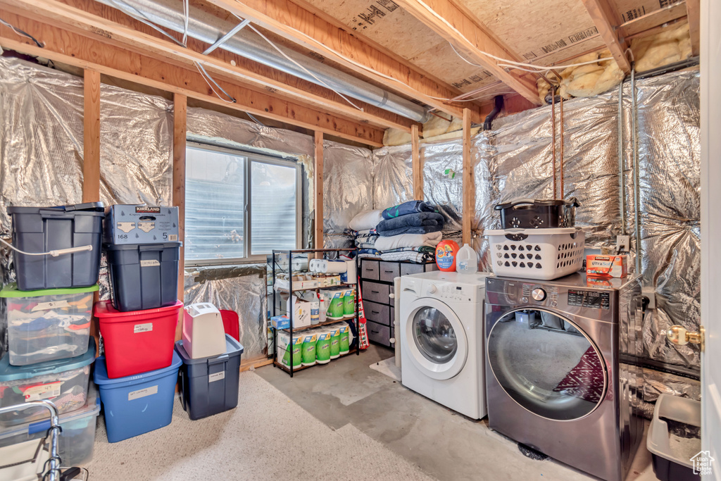 Washroom featuring washer and dryer