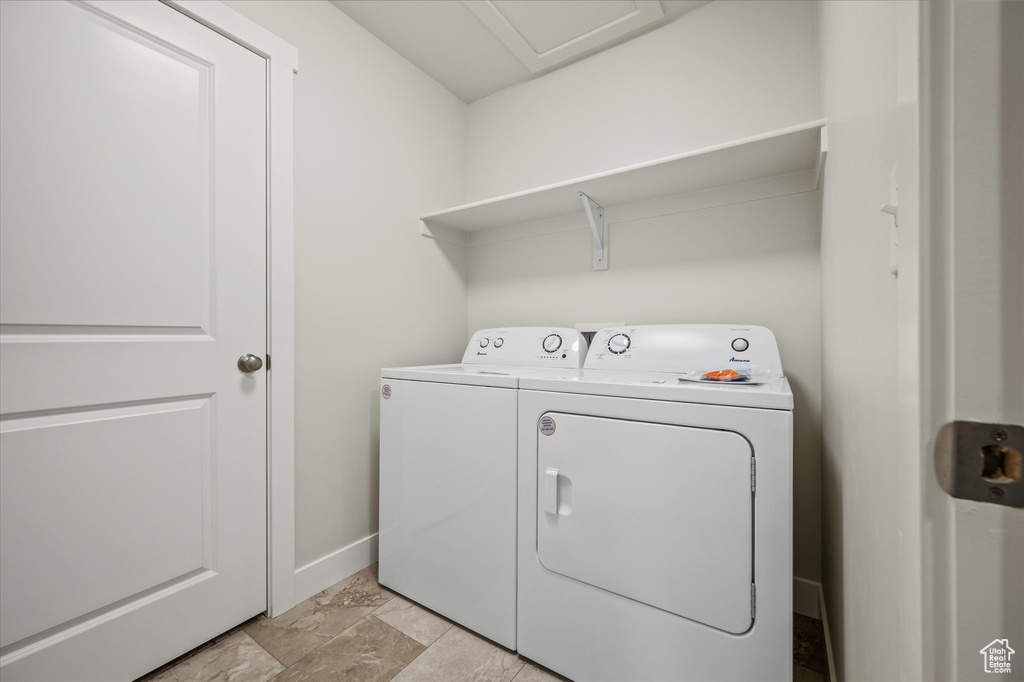 Laundry room with washer and dryer