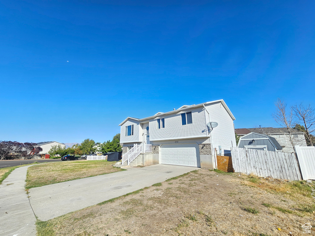 View of front of house with a garage