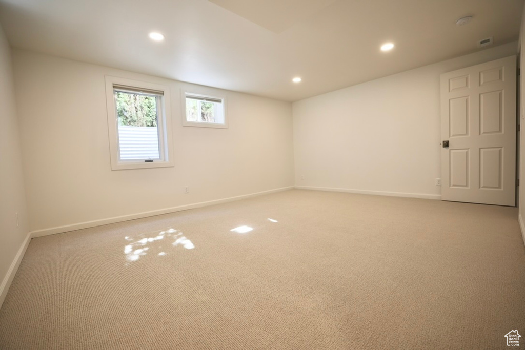 Empty room with carpet flooring