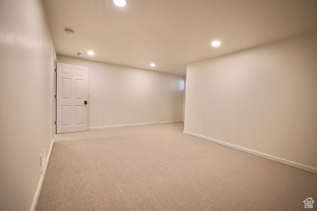 Basement featuring carpet