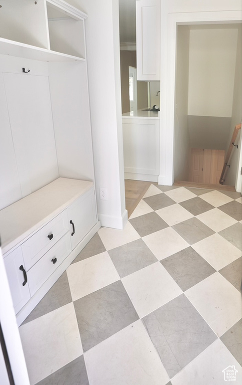 Mudroom with crown molding