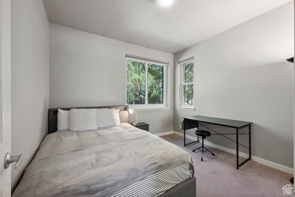 View of carpeted bedroom