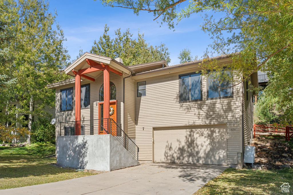 View of front of house with a garage