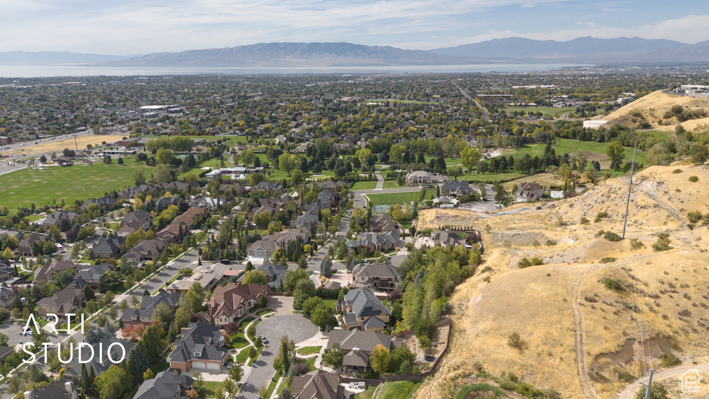 Birds eye view of property with a mountain view