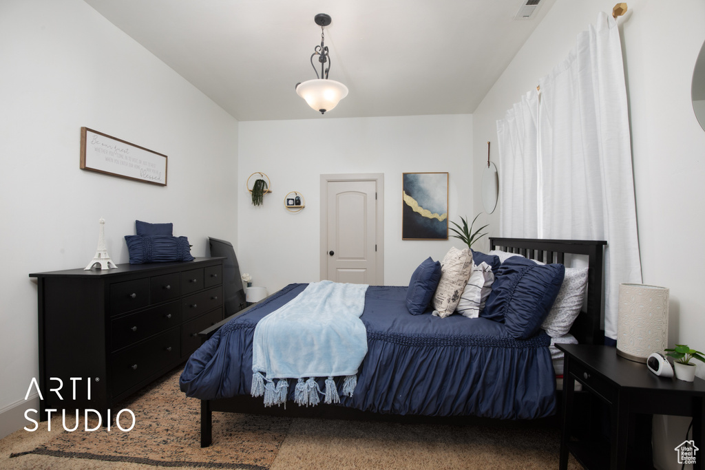 View of carpeted bedroom