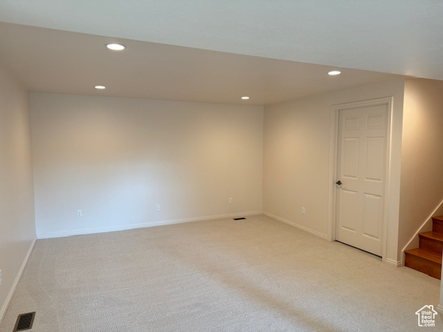 View of carpeted spare room