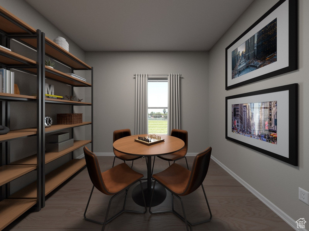 Dining space featuring hardwood / wood-style floors