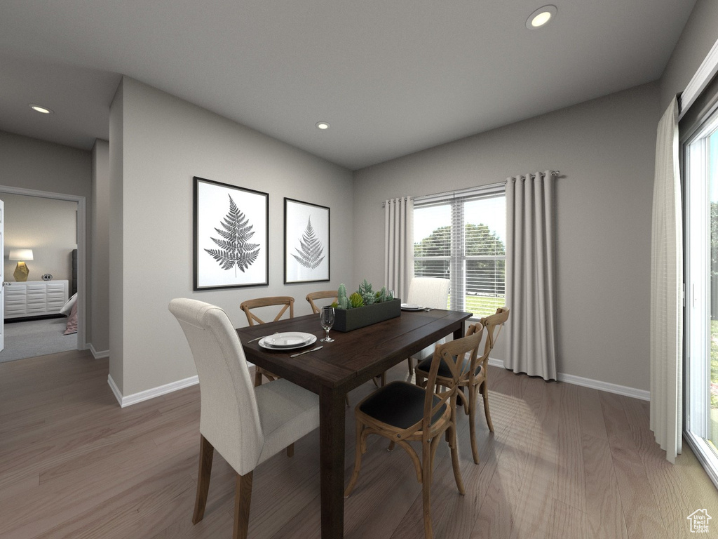 Dining space featuring light hardwood / wood-style flooring