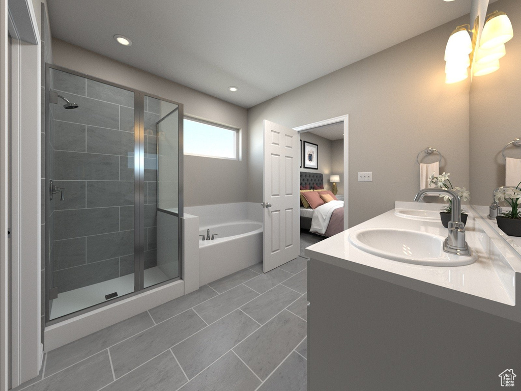 Bathroom featuring shower with separate bathtub, tile patterned flooring, and vanity