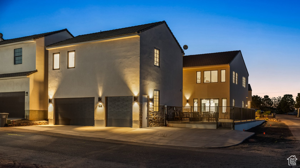 View of front of property with a garage