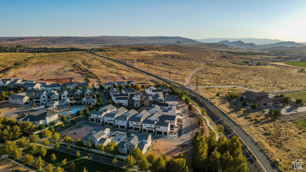 Birds eye view of property featuring a mountain view