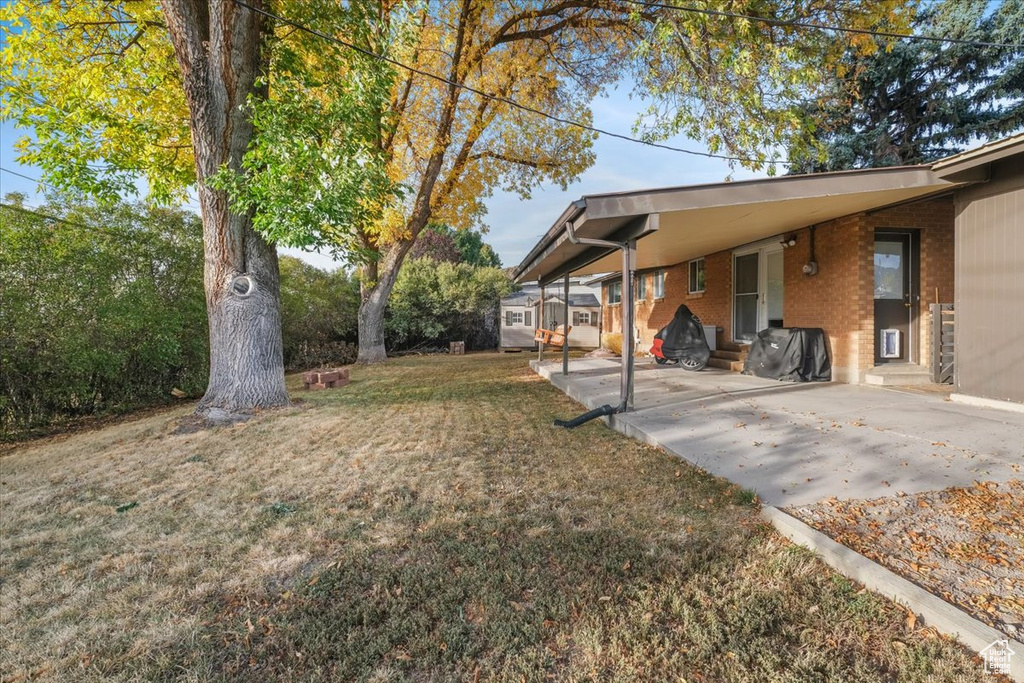 View of yard featuring a carport