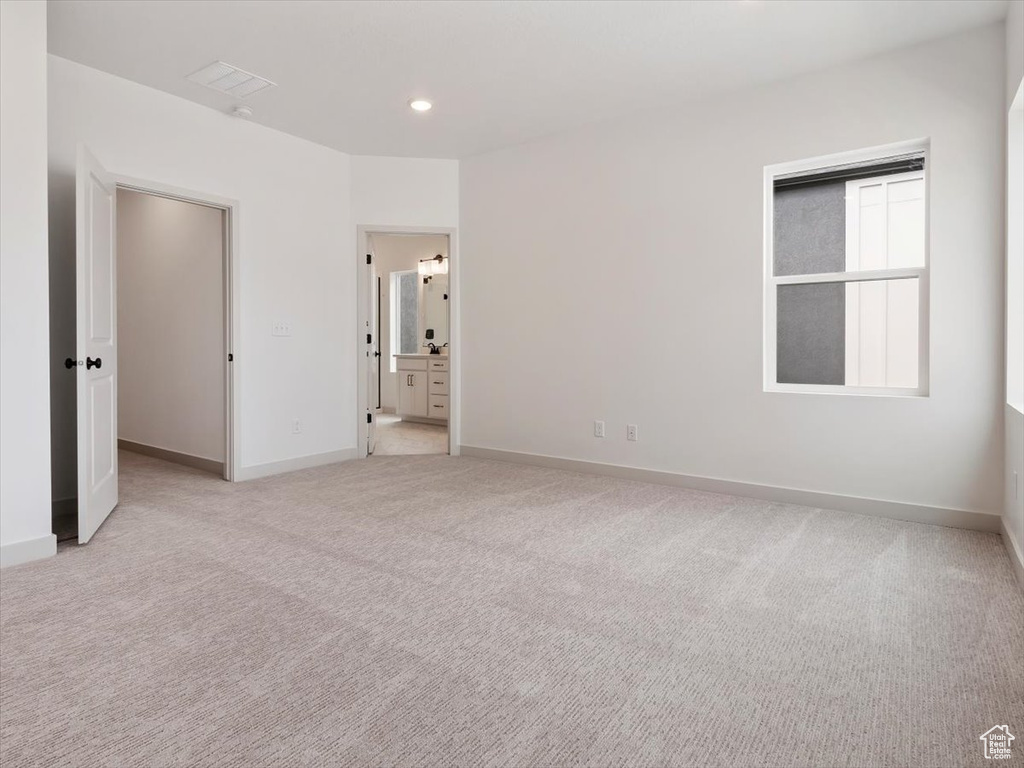 View of carpeted spare room