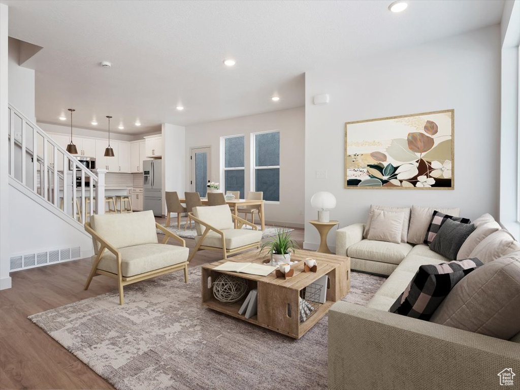 Living room featuring light hardwood / wood-style floors