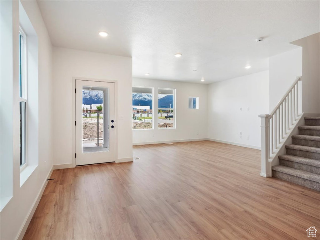 Interior space with light hardwood / wood-style flooring