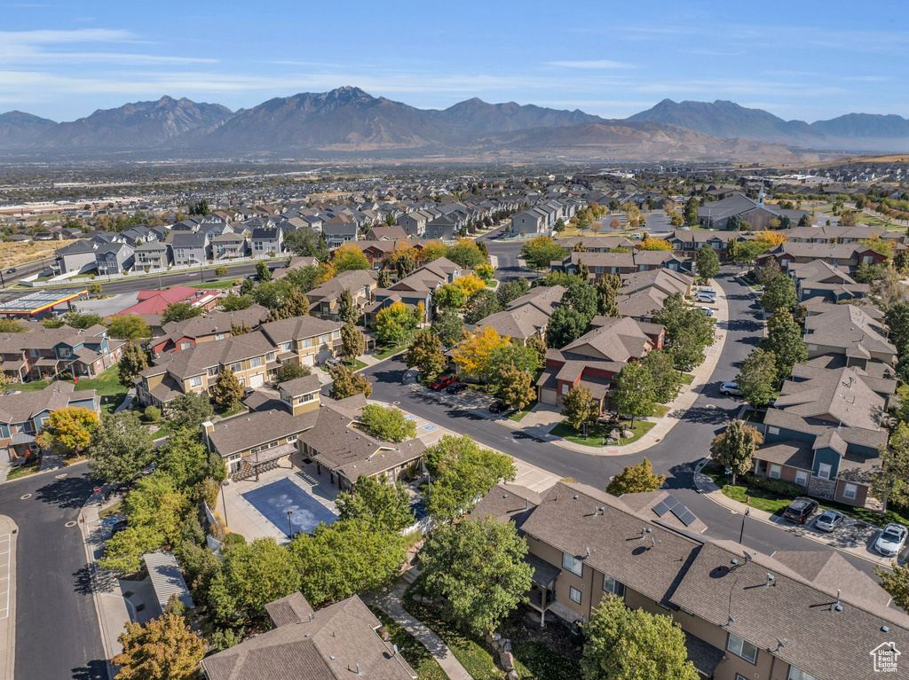 Birds eye view of property with a mountain view