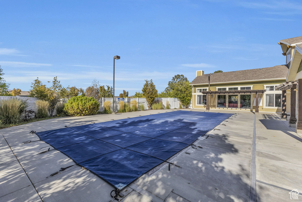 View of swimming pool featuring a patio