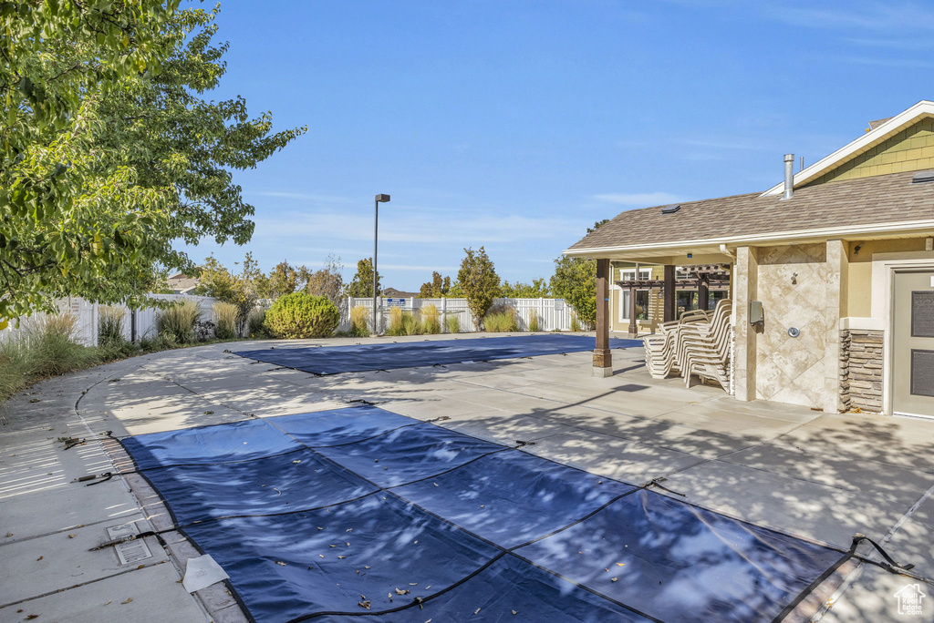 View of swimming pool featuring a patio