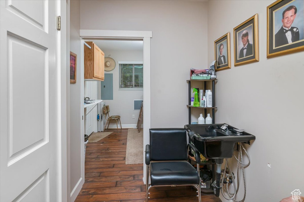 Interior space with dark hardwood / wood-style flooring