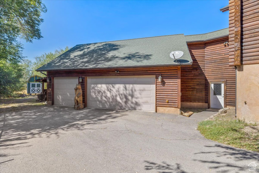 Exterior space featuring a garage