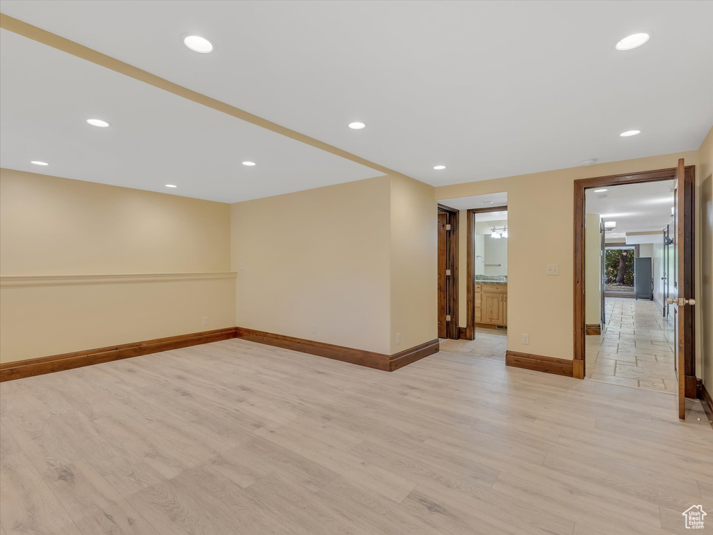 Unfurnished room featuring light wood-type flooring