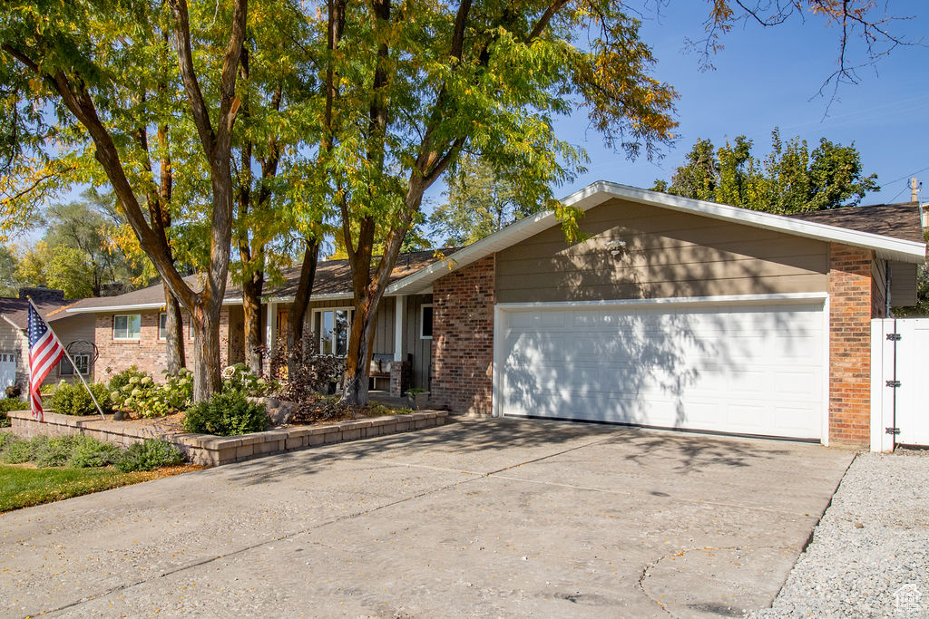 Single story home with a garage