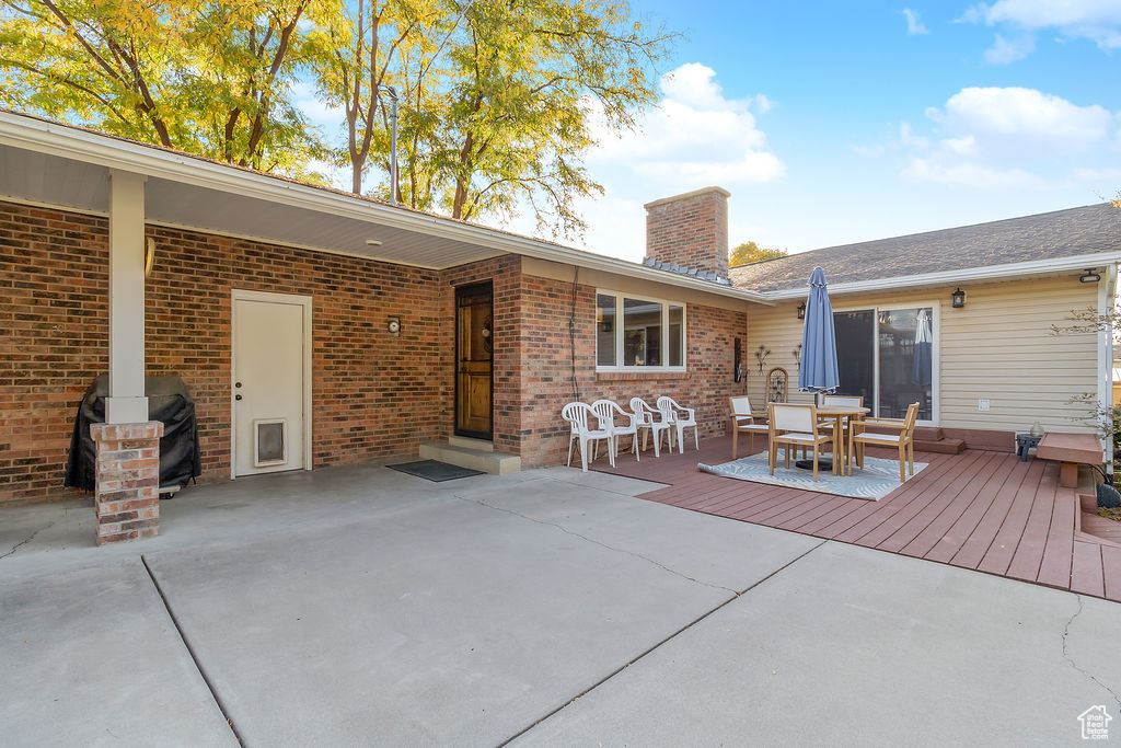 Rear view of property featuring a patio