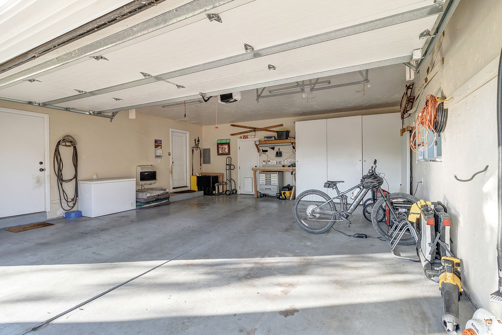 Garage featuring a garage door opener