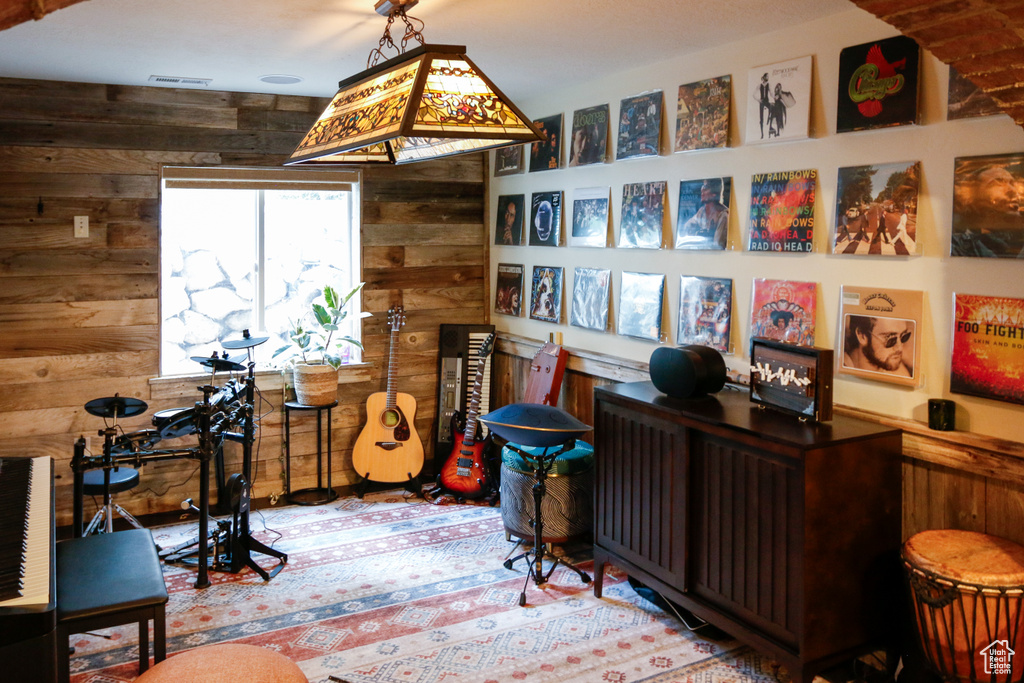 Office area with wooden walls